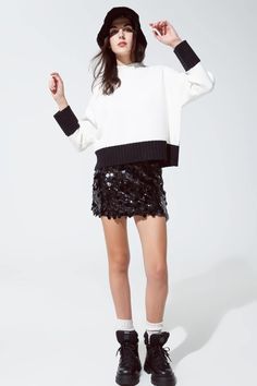 Step into the spotlight with our Big Sequin Mini Skirt in Black – your go-to choice for making a glamorous statement at any party. Eye-Catching Big Sequins: Adorned with large, shimmering sequins, this skirt captures and reflects light beautifully, ensuring you're the center of attention. Quality Craftsmanship: Crafted with 100% Polyester and lined for comfort, this skirt combines durability with a luxurious feel. Flattering High-Waist Design: The high-waisted cut not only flatters your figure b Big Sequins, Edgy Boots, Wholesale Clothing Distributors, Mini Skirt Party, Body Noir, Mens Lightweight Jacket, Sequin Mini Skirt, Elegant High Heels, Sequin Mini Skirts