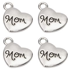 PRICES MAY VARY. Material: Alloy metal; Color: Silver. Size: 15mm x 17mm / 0.59inch x 0.67inch; Hole Diameter: 2.5mm / 0.1inch. Quantity: 25pcs. There is a hole on the charm for easy attachment. Double-sided lettering”mom”. This sturdy mom pendant can be applied to your necklace, hoop earrings, anklets or bracelets, minimalism fashion style, elegant and cute. These bright mom charms can be used in a variety of ways like DIY earrings, charm bracelets, mother’s day gifts, zipper pulls, keyrings, s Metal Heart Beads Jewelry For Mother's Day, Mother's Day Metal Jewelry With Heart Beads, Mother's Day Metal Heart Beads Jewelry, Mother's Day Jewelry Charms, Silver Heart Charms For Birthday, Mother's Day Heart Beads Dangle Jewelry, Heart Charm For Birthday And Mother's Day, Personalized Heart Charms For Birthday, Mother's Day Dangle Charms For Jewelry Making