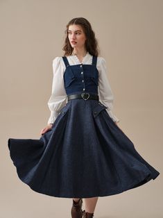 "Imagine strolling through a meadow, the soft wool gently swaying with each step. The skirt's graceful silhouette and delicate pattern evoke a sense of romance, transporting you back to a bygone era of refined charm. The premium wool material ensures you'll feel luxurious and warm, perfect for  tackling those trans-seasonal temperatures. And let's not forget the pockets - these hidden gems come as a delightful surprise, ensuring both style and functionality. Whether it's a day of work or play, slip this skirt on and be ready for whatever comes your way. 【Fabric】 Wool 87%, Elastane 13%. Fully lined. 【Length】 33 inches. 【Size】 *SIZE XS  waist: 26\"/ 66 cm *SIZE S  waist: 27\"/ 70 cm *SIZE M  waist: 29/ 75 cm *SIZE L waist: 31.5\" / 80 cm SIZE XL Waist: 33\"/ 85cm SIZE 2XL waist : 35\" / 90 c Fall Dresses With Pleated Relaxed Skirt, Fall Flowy Midi Skirt Dresses, Flowy Midi Skirt Dress For Fall, Fall Dresses With Relaxed Full Skirt, Long Lined Skirt Dress For Fall, Fall Long Skirt Lined Dress, Relaxed Full Skirt Dresses For Fall, Fall Midi Dress With Relaxed Skirt, Fall Dresses With Gathered Full Skirt