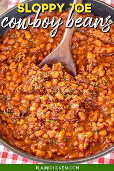 sloppy joe casserole beans in a skillet with a wooden spoon on the side