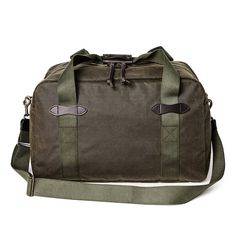 This Dufflel Bag only gets better over time Rectangular Outdoor Travel Bag With Top Carry Handle, Outdoor Rectangular Travel Bag With Top Carry Handle, Rectangular Travel Bag With Reinforced Handles For Weekend Trips, Classic Large Capacity Bags For Outdoor, Functional Waxed Canvas Bags For Overnight Trips, Rectangular Waxed Canvas Duffle Bag For Overnight Trips, Functional Waxed Finish Bag For Overnight Trips, Classic Outdoor Travel Bag With Luggage Sleeve, Functional Rectangular Waxed Canvas Weekender Bag