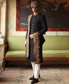 <p><strong>Sherwani:</strong><br />Color: Black<br />Fabric: Jamawar<br />Sherwani features rich quality embellishments accent the on collar and sleeves<br />Fanciful front button closure</p> <p><strong>Inner:</strong><br />Comes with off-white kurta and pajama<br /><br /><strong>Additional Accessories:<br />Tied pre-made Turban: </strong>US$150<strong><br /></strong><strong>Mens Embroidered Shawl (subject to the availablity) As shown: </strong>US$200<strong><br /></strong><strong>Jodhpuri/Salee Black Semi-stitched Elegant Sherwani, Elegant Embroidered Jamawar Bandhgala, Elegant Black Semi-stitched Sherwani, Formal Straight Kurta Bandhgala With Intricate Embroidery, Designer Long Sleeve Nehru Jacket With Intricate Embroidery, Designer Long Sleeve Nehru Jacket With Embroidery, Elegant Designer Nehru Jacket With Dupatta, Elegant Nehru Jacket With Dupatta For Designer Wear, Designer Long-sleeve Embroidered Nehru Jacket