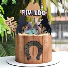 a wooden box with some metal decorations on it's side and a sign that says rivaldo