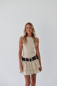 Channel your inner New York fashionista with the Midnight Metro Belted Dress. This khaki colored mini dress features a chic and trendy belted design, perfect for a night out on the town. So go ahead, make a statement and turn heads with this sophisticated yet playful dress. Fitted Mini Dress With Belt For Summer, Fitted Beige Belted Summer Dress, Fitted Beige Belted Dress For Summer, Elegant Belted Mini Dress For Summer, Mini Length Belted Dress For Day Out, Chic Mini Dress For Going Out, Chic Summer Mini Dress With Belt, Summer Beige Belted Dress, Chic Belted Dress For Spring Parties