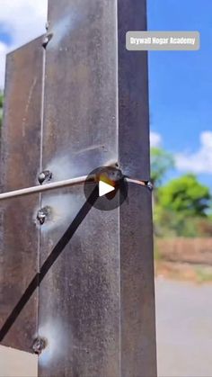 an image of a metal post with a hole in it that has been cut open