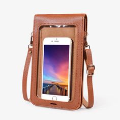 a brown leather case with an iphone in it