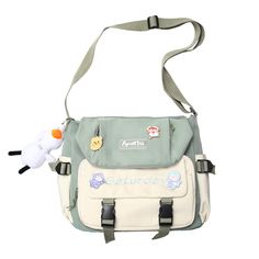 PRICES MAY VARY. 🌎 Material: The cute messenger bag made of high-quality nylon material, smooth and wear-resistant surface, soft and comfortable to the touch, high-quality smooth zipper, easy to open or close, high-quality stitching for long-lasting durability. 🌎 Size: This kawaii crossbody bag size is 33*11*28cm/12.99*4.33*11.02in, medium size, with enough storage space, easy to carry pad, mobile phone, wallet, cosmetics, books and other items. 🌎 Structure: The messenger bag aesthetic consists of a zipper main pocket, a front zipper pockets, a front slip pockets and two side pockets. The flap part is designed with a small zipper pocket. and you can store your items in categories. 🌎 Matching: The nylon crossbody bags is a cute plush duck doll pendant in the package, it is fashionable, Aesthetic Messenger Bag, Cute Messenger Bag, Cute Messenger Bags, Work Travel Bag, Student Book, Canvas Messenger Bag, Crossbody Bags For Women, Canvas Crossbody Bag, Bags Aesthetic