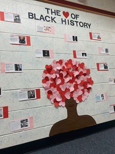 a bulletin board with hearts in the shape of a woman's head on it