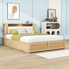 a bedroom with light blue walls and wood flooring is pictured in this artist's rendering