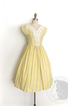 "vintage dress  Era: 1950's Label: none Material: feels like cotton, embroidery, lace and rhinestones  Closure: side metal zipper Colour: yellow, white, black  Details: gingham checkered pattern with sheer/open weave embroidered stripes, bodice detailed with rhinestones and lace, timeless fit and flare silhouette Fits like: small Bust: 34\" Waist: 27/28\" Hip: free Length: 43\" Condition: There's a faint spot on the back of the bodice. At the top of the zipper there are two spots. A tiny hole and a spot on the back of the skirt. Some rhinestones are a touch cloudy. Priced accordingly. Washed and ready to wear.  shop policy  * All items are a final sale. No returns, exchanges and, order cancellations are not accepted.  * Ruby Mae Rose is not responsible for lost or stolen parcel(s) and any 1950’s Dress, Ruby Mae, 1950's Dress, 1950’s Style, 1950’s Fashion, Vintage 1950s Dress, Vintage Dresses 50s, Vintage 1950s Dresses, Rose Vintage