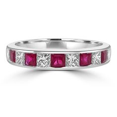 a white gold ring with ruby stones and diamonds on the sides, set in 18k white gold