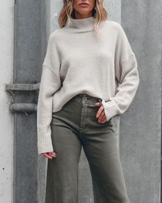 Stay cozy and stylish with the Valley Lodge Wool Turtleneck Sweater! Made with a blend of acrylic, nylon, wool, and spandex, this oversized sweater provides ultimate comfort and the perfect fit. Its long sleeves and turtleneck design keep you warm while adding a touch of sophistication to your outfit. Simply style it with jeans, ankle booties, and mixed accessories to complete the look. Winter White High Neck Sweater For Winter, High Neck Winter White Sweater, Wool Funnel Neck Polo Sweater For Fall, Wool Polo Sweater With Funnel Neck For Fall, Casual Cable Knit Turtleneck For Cold Weather, Relaxed Fit Turtleneck For Winter, Casual Cable Knit Turtleneck With Funnel Neck, Casual Cable Knit Funnel Neck Sweater, Cozy High-neck Sweater