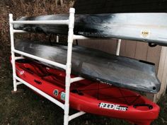 two kayaks are stacked on top of each other