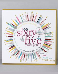 the sixty five years young greeting card has colorful lines on it and is in front of a white background