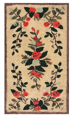 a rug with flowers and leaves on it