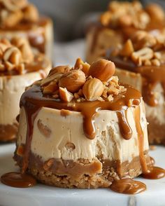 three desserts with peanut butter and nuts on top