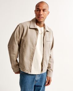 Our new trucker-style jacket in a cozy twill fabric and cropped length, featuring a relaxed-fit silhouette, left chest pocket, side pockets, corduroy fold-down collar, zip-up front and lightweight interior lining. Workwear Jacket, Men's Coats & Jackets, Winter Clothes, Twill Fabric, Zip Up, Chest Pocket, Mens Coats, Abercrombie Fitch, Winter Outfits