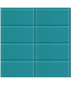 a blue tile wall with several different colors