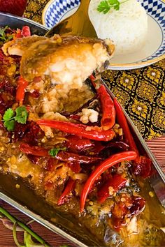 Thai fried fish with tamarind sauce topped with red chilies and a portion of white rice on the side. Thai Fried Fish, Tamarind Paste Recipes, Tamarind Fish Curry, Tamarind Sauce Recipe, Thai Fish Recipe, Chili Paste Recipe, Tamarind Fish, Thai Ingredients, Tamarind Recipes