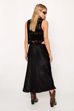 Down here. Feel fierce in our midi skirt, made in high quality satin, with a stellar fit and flare silhouette, and a striking shimmer fabric. Pairs well with a crop top or blouse and strappy heels for a look perfect for wedding guest days, date nights, and nights out. Bias Cut Shimmer Satin Midi Skirt High Quality Satin Fabric Stellar Bias Cut Statement Shimmer Details Flattering Flared Silhouette Comfortable High Waistline Model wears a size M (US size 6/UK size 10). Petite Midi Skirt, Shimmer Fabric, Lace Skater Dress, Satin Midi Skirt, Petite Skirt, Date Nights, Halterneck Dress, Going Out Dresses, Petite Dresses