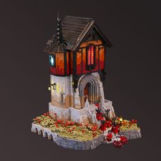 a small house made out of legos is shown in the air with flowers on the ground