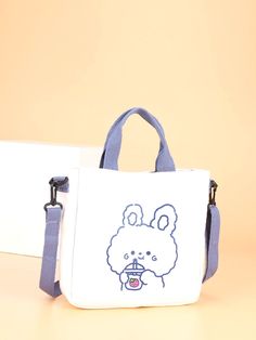 Bag For Love - Cartoon Graphic Top Handle Bag - Women Tote Bags Product Description Style Preppy Color White Quantity 1 piece Strap Type Adjustable Pattern Type Cartoon Bag Size Medium Magnetic No Type Top Handle Bag Material Canvas Composition 100% Cotton Size Chart INCH CM Size Bag Width Bag Height Bag Length Strap Length one-size 3.1 9.4 11 41.3 Size Bag Width Bag Height Bag Length Strap Length one-size 8 24 28 105 Similar Products h2 { text-align: center; } .red-box { width: 100%; display: f Kipling Handbags, Cartoon Bag, Mk Handbags, Studded Bag, Brown Leather Totes, Style Preppy, Graphic Top, Coach Shoulder Bag, Leather Handbags Tote