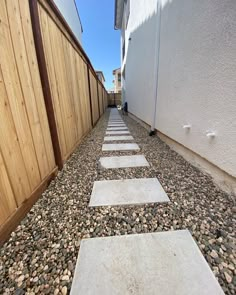 there is a stone path between two buildings