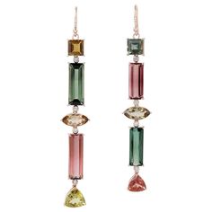 These beautiful linear drop earring are handcrafted in 18-karat gold. It is set with 33.72 carats tourmaline and .30 carats of glimmering diamonds. FOLLOW MEGHNA JEWELS storefront to view the latest collection & exclusive pieces. Meghna Jewels is proudly rated as a Top Seller on 1stDibs with 5 star customer reviews. All items manufactured by us are handmade and can be customized or redesigned. Composition Size-83 MM Total Weight-14.398 Gold Weight(Gms)-7.593 Diamond Wt(Cts)-0.3 Tourmaline Wt(Cts Julary Jewelry Design, Gemstone Settings, Roman Jewelry, Ear Drops, Multicolor Jewelry, Tourmaline Earrings, Gem Earrings, Semi Precious Gems, Silver Jewelry Design