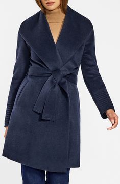 Take joy in the luxury of this wrap coat knit from a delightfully soft, midweight alpaca-blend yarn with a touch of warm wool for added resilience. An oversized shawl collar sets this beautiful layer apart and the streamlined pockets offer an excellent place for small essentials. 35 1/2" center-back length True wrap style Shawl collar Removable tie belt Side welt pockets Lined 70% alpaca, 30% wool Dry clean Made in Peru Wrap Coat, Belt Tying, Shawl Collar, Tie Belt, Outerwear Women, Long Coat, Welt Pockets, Wrap Style, Alpaca