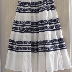 Parcelle Ruffle Swing Long White Navy Skirts Size:M Ewaist (Elasic) 14"- 16" Length 36" White Floral Embroidered Tiered Skirt, White Embroidered Tiered Skirt, White Bohemian Skirt With Embroidered Hem, Bohemian White Skirt With Embroidered Hem, White Embroidered Skirt For Vacation, Bohemian Maxi Skirt, Grey Maxi Skirts, Navy Embroidery, Mesh Maxi Skirt