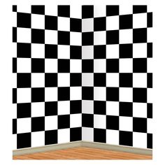 an empty room with black and white checkerboard wallpaper on the walls, in front of a wooden floor