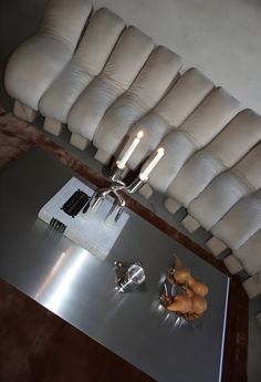 a metal table with some candles on it