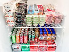 a refrigerator filled with lots of food and drinks