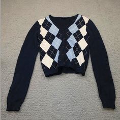 This Is A Brandy Melville Cardigan/Sweater. It Has A Blue White And Navy Argyle Design. I've Only Worn This Once To A Birthday Party But Other Than That Is It Unused. Blue Crew Neck Trendy Cardigan, Trendy Blue Crew Neck Cardigan, Preppy Long Sleeve Fall Sweater, Blue Cotton Cropped Sweater For Winter, Fitted Preppy Winter Sweater, Trendy Navy Sweater For Winter, Navy Fitted Sweater For Fall, Black Cotton Cropped Sweater For Winter, Navy Preppy Sweater For Fall