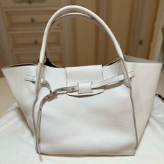 Beautiful Celine Big Bag In White Grain Leather! It Is Brand New, My Mom Bought And Changed Her Mind. It Is In The Medium Size And Can Come With A Pink Organizer Upon Request! Open To Offers High-end White Bag For Daily Use, High-end White Shoulder Bag For Shopping, White Top Handle Bag With Palladium Hardware, High-end White Bag With Palladium Hardware, Leather Bags With Rolled Handles For Everyday Luxury, High-end White Shoulder Bag For Daily Use, Designer White Bag With Rolled Handles, Designer White Bags With Rolled Handles, Cream Bag With Palladium Hardware And Double Handle