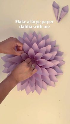 someone is making a paper dahlia with me