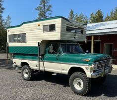 a truck with a camper attached to it