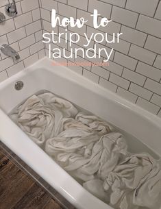 a bathtub filled with lots of white towels and the words how to strip your laundry