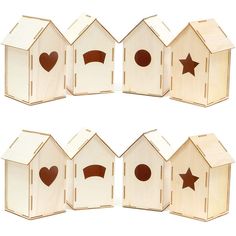 six wooden birdhouses with different shapes and sizes, each with a brown heart in the middle