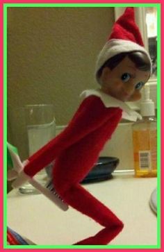 an elf is standing in front of a mirror with the caption 22 days until christmas