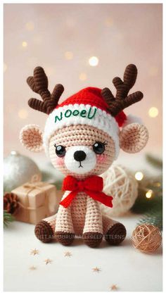 a crocheted stuffed animal wearing a santa hat