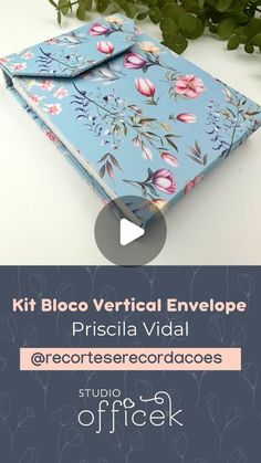 a blue book with flowers on it and the title kit bloc vertical envelope prisica vidal