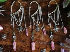 PRICE FOR 1 EAR WRAP! Crystal ear cuff with pink quartz crystal handmade by MyShinyBox. Each crystal is hand-selected and arranged with care and wire-wrapped with good intentions. The perfect gift for the crystal/gem lover in your life! My video instruction on HOW to wear my ear cuff (Insta Reel Video) https://bit.ly/3QkUp4Y See more of my ear cuffs and earrings - https://etsy.me/3SxnsEo If you would like a pair and two are not available, send me a message and I'll see if I can make a matching s Ear Wraps No Piercing, Handmade Pink Fantasy Jewelry, Handmade Pink Fairy Jewelry, Pink Bohemian Crystal Earrings For Pierced Ears, Bohemian Pink Crystal Earrings For Pierced Ears, Handmade Mystical Pink Jewelry, Pink Bohemian Crystal Earrings, Pink Handmade Mystical Jewelry, Pink Mystical Handmade Jewelry