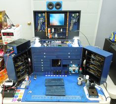 an assortment of electronic equipment on display in a room