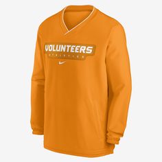 The Tennessee Volunteers Sideline Windshirt features a water-repellent exterior and a soft, warm interior for inclement weather. A bungee cord at the hem and 2 front pockets add functionality to this team-inspired piece. Nike Long Sleeve Windbreaker For Sports Events, Orange Sporty Windbreaker For Sports, Orange Sporty Windbreaker, Sporty Orange Windbreaker, Orange Nylon Long Sleeve Windbreaker, Orange Long Sleeve Sporty Windbreaker, Orange Long Sleeve Nylon Windbreaker, Orange Sporty Windbreaker For Outdoor, Sporty Orange Windbreaker For Outdoor