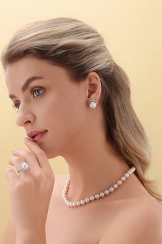 Treat yourself to timeless elegance with these 11-12mm Freshwater Pearl & Rose Floral Earrings from House of Pearls. Classically crafted from freshwater pearls, these earrings exude a classic charm that never goes out of style. The soft, rosy hue of the pearls gives them an added sense of allure, while the simple design keeps them versatile enough to wear it with almost any outfit. Perfect for casual or formal occasions, these timeless studs will add a hint of luxury to any ensemble. This popula Refined Round Pearl Earrings As Gift, Refined Round Pearl Earrings For Gift, Timeless Pearl White Pearl Earrings, Timeless Pearl White Jewelry With Matching Earrings, Timeless Akoya Pearl White Pearl Earrings, Timeless Pearl White Earrings With Pearl Pendant, Classic Pearl White Jewelry With Matching Earrings, Timeless Pearl Jewelry With Matching Earrings, Elegant Round Akoya Pearl Earrings