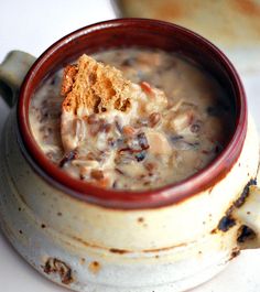 a close up of a bowl of food on a table