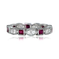 A beautiful vintage style wedding band, adorned with diamonds and French-cut rubies and mounted in a stunning platinum setting. Classic Red Ruby Ring With Single Cut Diamonds, Classic White Gold Ruby Ring With Single Cut Diamonds, Classic Marquise Red Diamond Ring, Classic Red Diamond Ring With Single Cut Diamonds, Classic Red Marquise Diamond Ring, Classic Ruby Eternity Band For Formal Occasions, Classic Red Diamond Ring In Platinum, Classic Ruby Ring With Single Cut Diamonds, Classic Red Diamond Platinum Ring