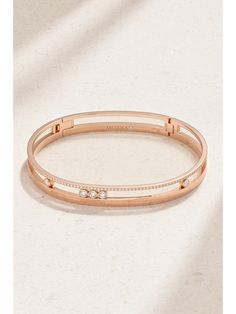 While Eva Longoria and Rihanna often wear Messika's stunning jewelry to red carpet events, founder Valérie Messika says her pieces are meant to be worn for all occasions. From the 'Move Romane' collection, this handmade 18-karat rose gold bangle is designed to look like two stacked bracelets - one is cutout and set with five round diamonds, while the other has a sparkling pavé setting. Coordinate yours with the matching ring.  Each Messika piece comes with a two-year warranty, which is activate… Stacked Bracelets, Rose Diamond, Rose Gold Bangle, Matching Ring, Eva Longoria, Gold Bangle, Diamond Bangle, Matching Rings, Stunning Jewellery