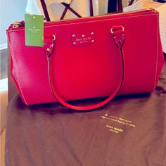 Brand New Kate Spade Martime Purse Never Been Carried. Stored In Dust Bag. Still Has Tag. Sku-Wkru1659 Style-Wellesley Color-Pillboxred In Pristine Condition! Unsnaps To Widen. 16" Wide, 10" Tall. Will Mail In Dust Bag. Gorgeous Color. Photos Don’t Do It Justice. Kate Spade Red Rectangular Shoulder Bag, Kate Spade Red Satchel Bag, Kate Spade Red Shoulder Bag For Formal Occasions, Red Kate Spade Shoulder Bag For Formal Occasions, Kate Spade Red Formal Shoulder Bag, Kate Spade Red Formal Bag, Elegant Red Kate Spade Shoulder Bag, Formal Red Kate Spade Bag, Classic Red Kate Spade Bag